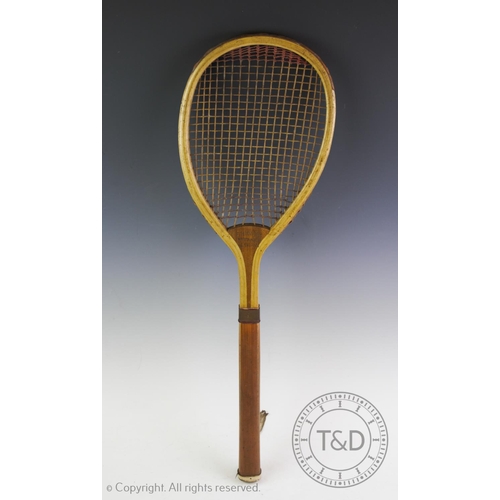 447 - A lawn tennis racket by F.H. Ayres of London circa 1880, with original intact strings the top of the... 