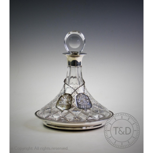 55 - A silver mounted ships decanter, J B Chatterley & Sons Ltd, Birmingham 1976, with cut glass tapering... 