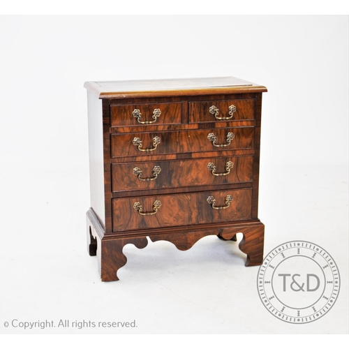 786 - A marquetry inlaid burr walnut bachelors type chest, possibly converted from a piano, with two short... 