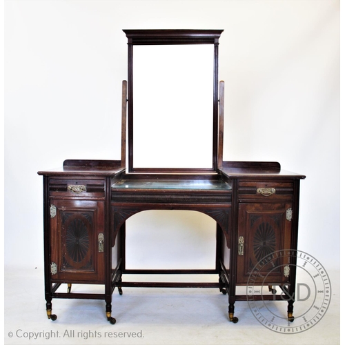 808 - A Edwardian walnut dressing table by Lamb of Manchester, the rectangular mirror raised upon later up... 