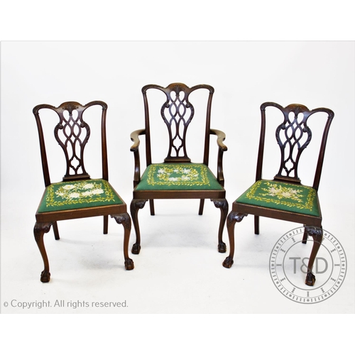 809 - A set of five Chippendale style mahogany dining chairs, 20th century, each chair with an interlaced ... 