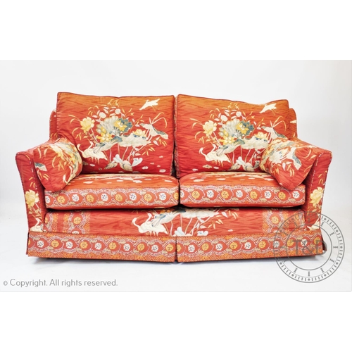 816 - A three piece chinoiserie lounge suite, to include a three seater settee, armchair and foot stool, a... 