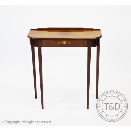 820 - A reproduction walnut and burr yew lamp table, 20th century, the circular tray top centred with a bu... 