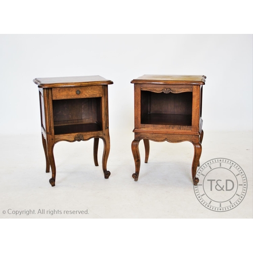 825 - A near pair of oak French style bedside tables, the smallest table with a serpentine moulded top abo... 