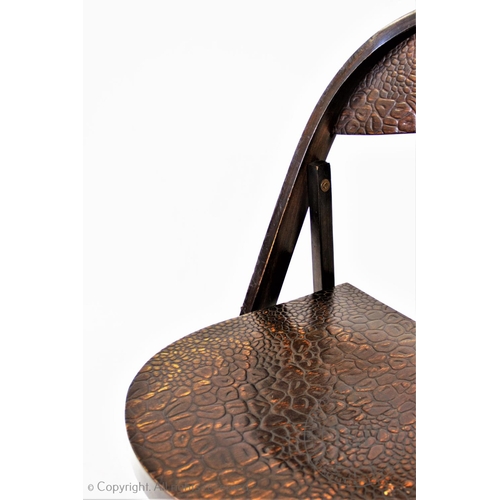 826 - Four Bauhaus Thonet folding chairs, the stained beech wood chairs with crocodile skin effect seats a... 