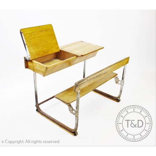 827 - A pair of vintage school desks, the twin combined  beech wood desks and benches mounted upon tubular... 