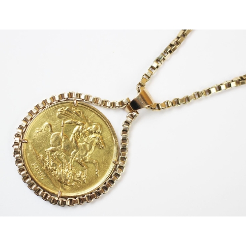 116 - A Victorian gold double sovereign £2 piece dated 1887, within yellow metal chain mount with chain st... 