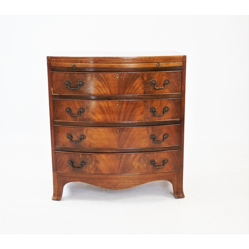 795 - A George III style mahogany bowfront chest of drawers, with a brushing slide above four long cock be... 