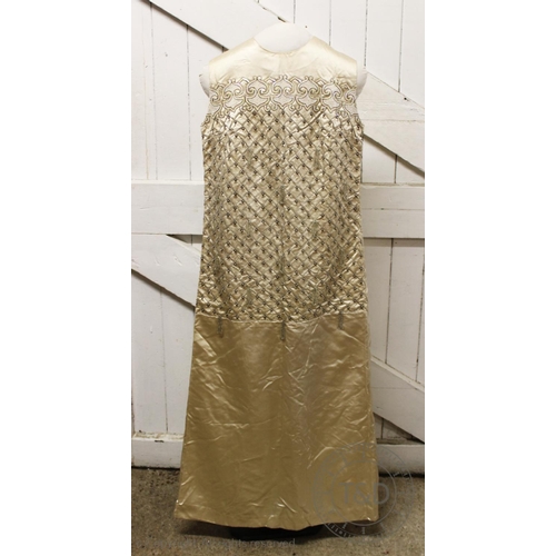 454 - A vintage hand made ivory silk ballgown with ornate beaded and embroidered decoration to the front