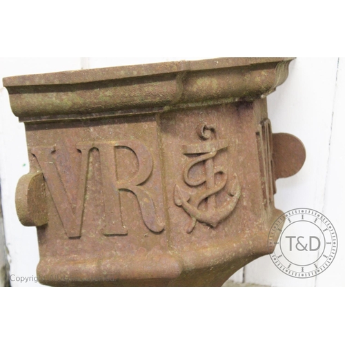 839 - A pair of Victorian cast iron corner gutter hoppers, of typical tapering form applied with the initi... 