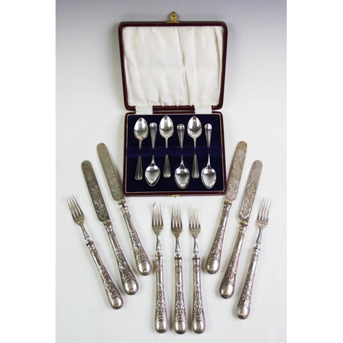 3 - A set of twelve Victorian silver dessert knives and forks, Martin Hall & Co, Sheffield 1867, the han... 