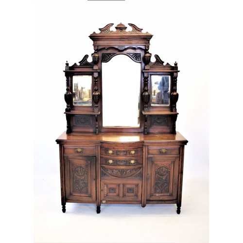 793 - A late Victorian walnut mirror back sideboard, the architectural high back with three mirrors, above... 