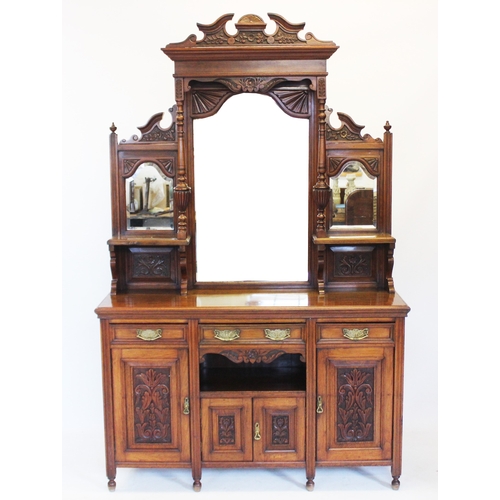 781 - A Victorian walnut mirror back sideboard, having an architectural raised back centred with a bevelle... 