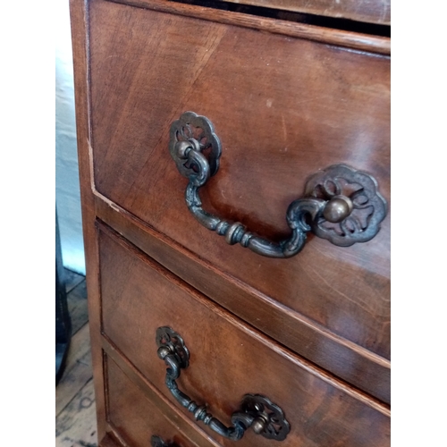 795 - A George III style mahogany bowfront chest of drawers, with a brushing slide above four long cock be... 