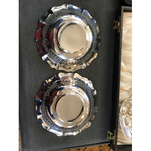 52 - A boxed pair of pierced silver dishes by SJ Lever & Co, Birmingham 1934, cusped border with pierced ... 