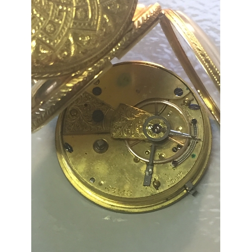 91 - A Victorian 18ct gold open face pocket watch, the engine turned dial with floral chapter ring, black... 