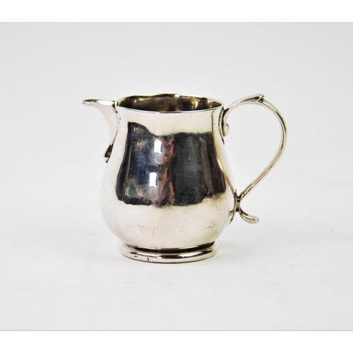 30 - A George I silver cream jug, James Goodwin, London 1718, of plain polished form, with sparrow beak l... 