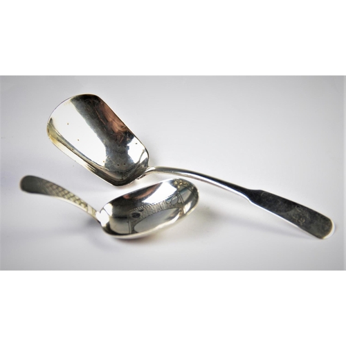 54 - A George III silver fiddle pattern caddy spoon 'I T', Birmingham 1797,11.8cm long, with a further Ge... 