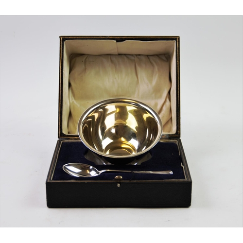 56 - A George V silver christening set, comprising: a silver bowl, Atkin Brothers, Sheffield 1919, of pla... 