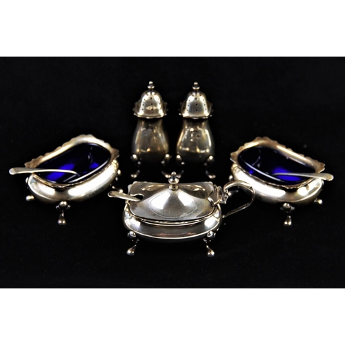 6 - A George V silver condiment set, Walker & Hall, Birmingham 1925, comprising: a pair of pepperettes, ... 