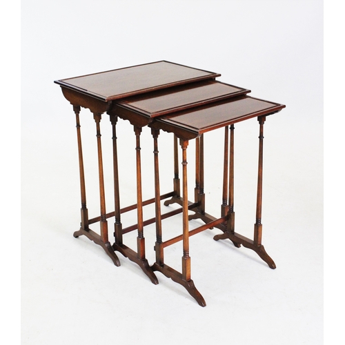 854 - A nest of three Regency style mahogany tea tables, early 20th century, each table with satinwood cro... 