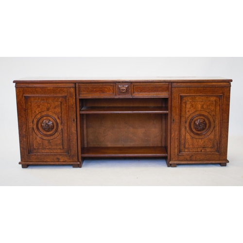 804 - A Victorian pollard oak bookcase, with a central frieze drawer above two open shelves flanked by a p... 