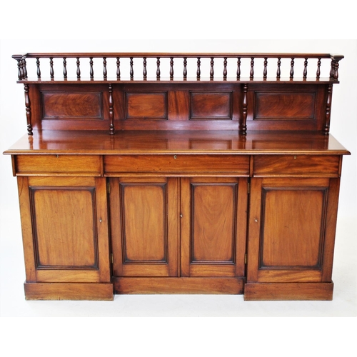 814 - A 19th century mahogany sideboard, the architectural raised back with a spindle gallery above a sing... 