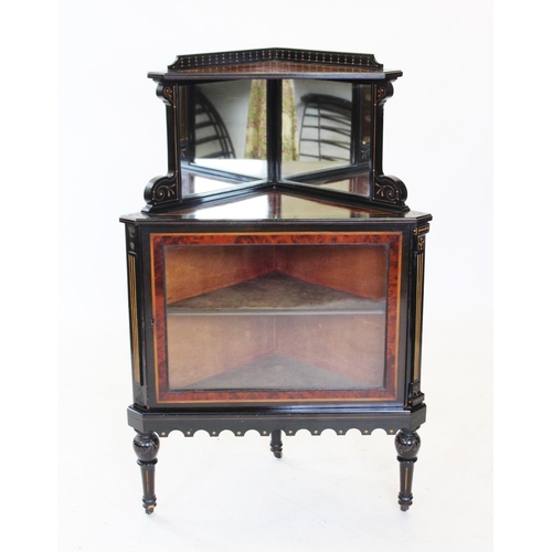 817 - A late Victorian Aesthetic free standing corner cupboard, the ebonised  and burr yew cabinet with tw... 