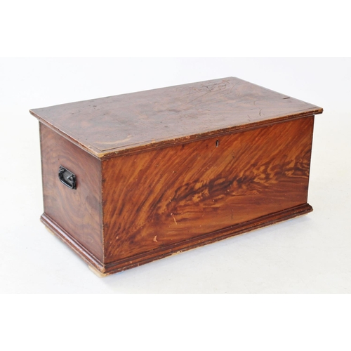 818 - A Victorian scumbled pine blanket box, with a fitted candle box and applied with iron swing handles,... 