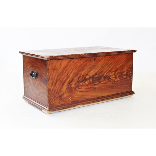 818 - A Victorian scumbled pine blanket box, with a fitted candle box and applied with iron swing handles,... 