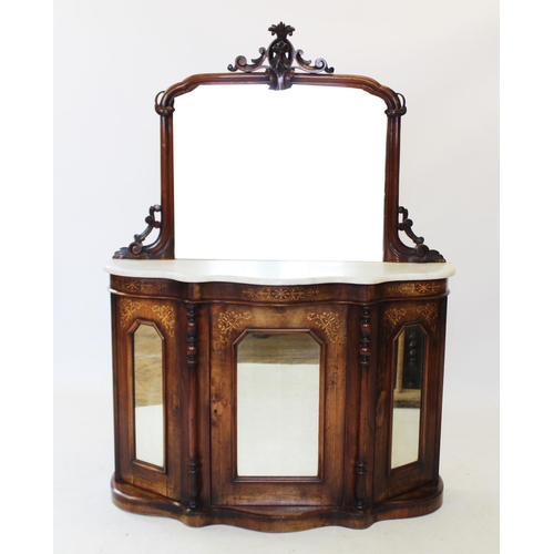 819 - A Victorian walnut mirror back chiffonier,the arched mirror with a carved leafy crest above the shap... 