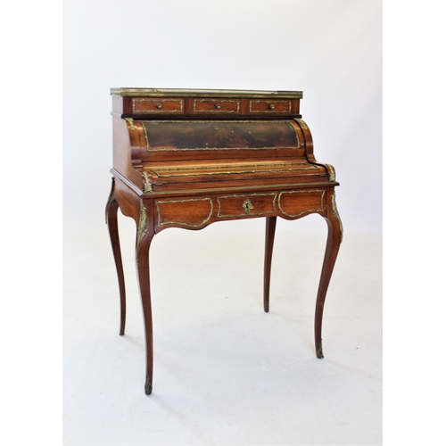 821 - A French rosewood bureau de dame, late 19th century, having a rouge marble top within an openwork gi... 