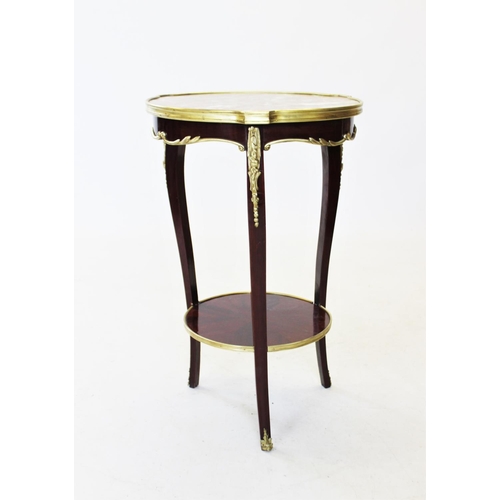 823 - An early 20th century French rouge marble top occasional table, the circular marble top raised upon ... 