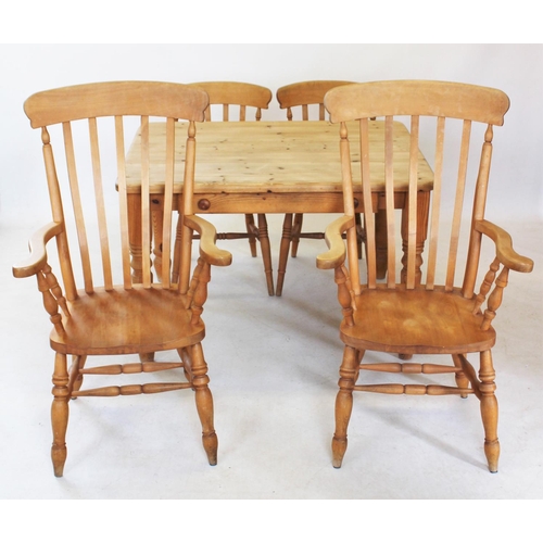 824 - A Victorian style pine slab top kitchen table, with a single frieze drawer, raised upon turned legs,... 