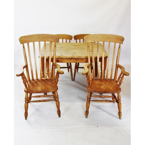 824 - A Victorian style pine slab top kitchen table, with a single frieze drawer, raised upon turned legs,... 