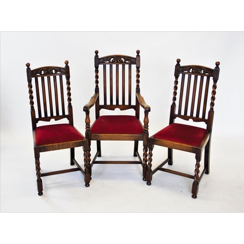 837 - A set of six 1930's oak dining chairs, each with a lath back and barley twist supports, to include o... 