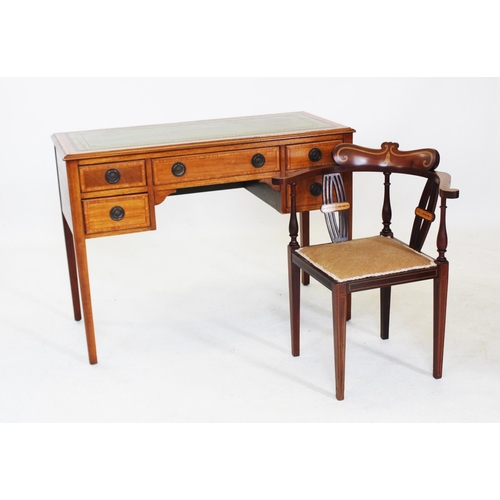 839 - An Edwardian mahogany and cross banded writing desk, with a green leather and gilt tooled writing su... 