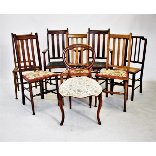 845 - A set of six Arts and Crafts stained beech dining chairs, each with a lath back and legs of tapering... 