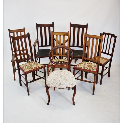 845 - A set of six Arts and Crafts stained beech dining chairs, each with a lath back and legs of tapering... 