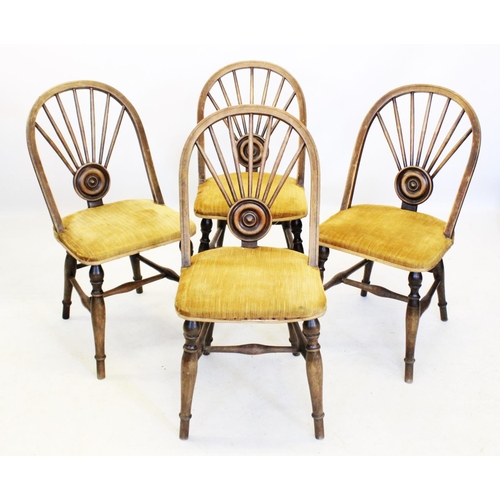 849 - A set of four late 19th/early 20th century stained beech wood kitchen chairs, the hoop backs with a ... 