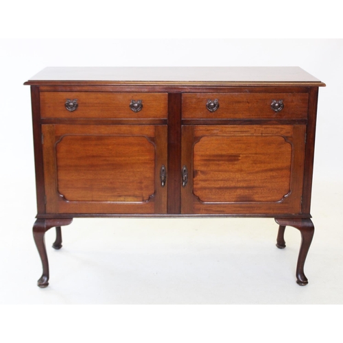 850 - An early 20th century mahogany sideboard, with two frieze drawers above a pair of cupboard doors, ra... 