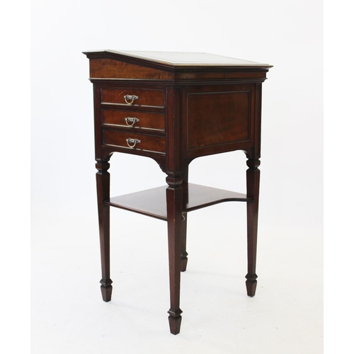 852 - An Edwardian walnut clerks desk, with a hinged sloping green leather writing surface above a vacant ... 