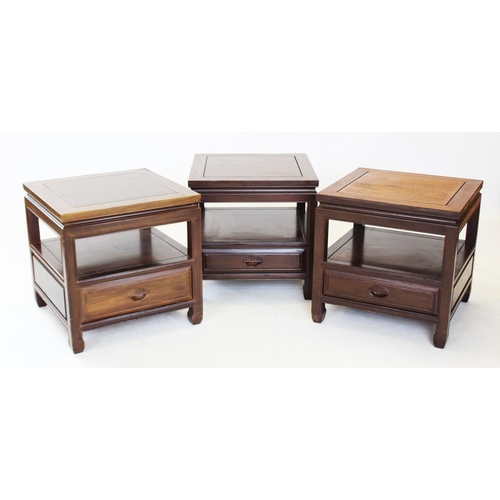 863 - A trio of Japanese influence rosewood lamp tables, the square tables with a lower shelf and frieze d... 