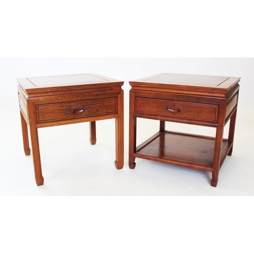 864 - A near pair of Japanese influence rosewood lamp/bedside tables,  each table with a frieze drawer and... 