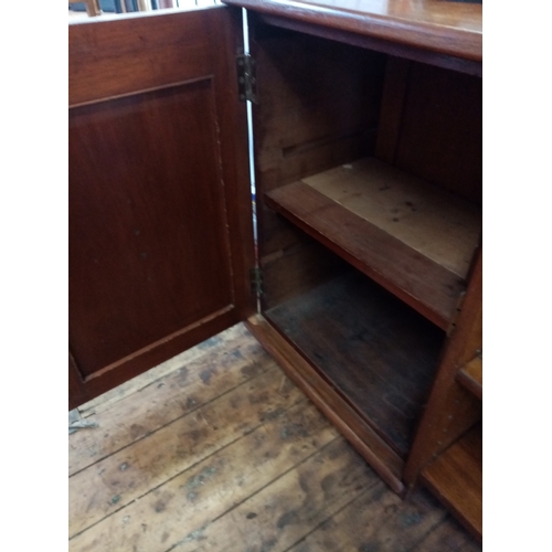 804 - A Victorian pollard oak bookcase, with a central frieze drawer above two open shelves flanked by a p... 