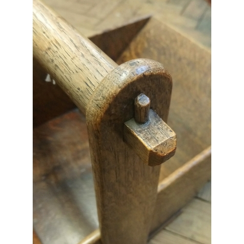 826 - A late 19th century oak trug, of tapering form with a turned fixed overhead handle, 60cm long