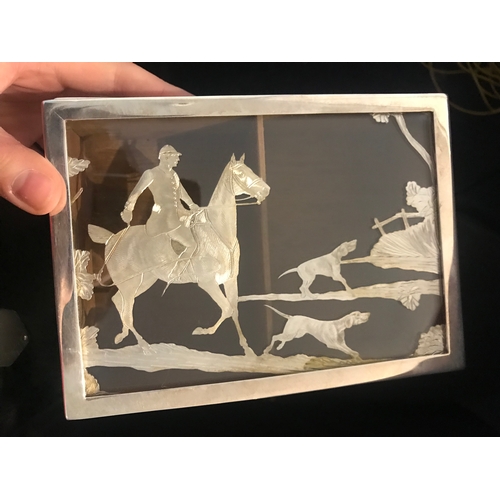 59 - Hunting interest: An early 20th century white metal rectangular cigarette box, of plain polished for... 
