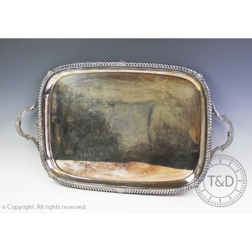 100 - An early 20th century silver plated twin handed serving tray, Elkington & Co, Birmingham, of lozenge... 