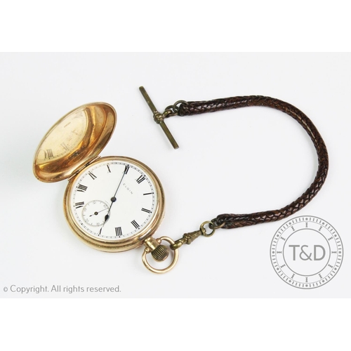 109 - An Elgin 9ct gold full hunter pocket watch, white enamel dial with black roman numerals and subsidia... 