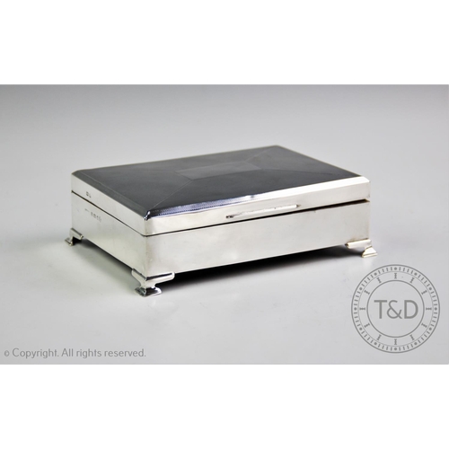 14 - A George V silver cigarette box, W T Toghill & Co, Birmingham 1935, of rectangular form, hinged cove... 